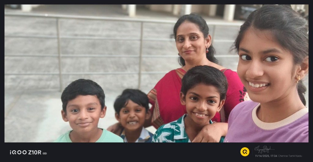 Children and instructor posing together for a Children's Day group photo